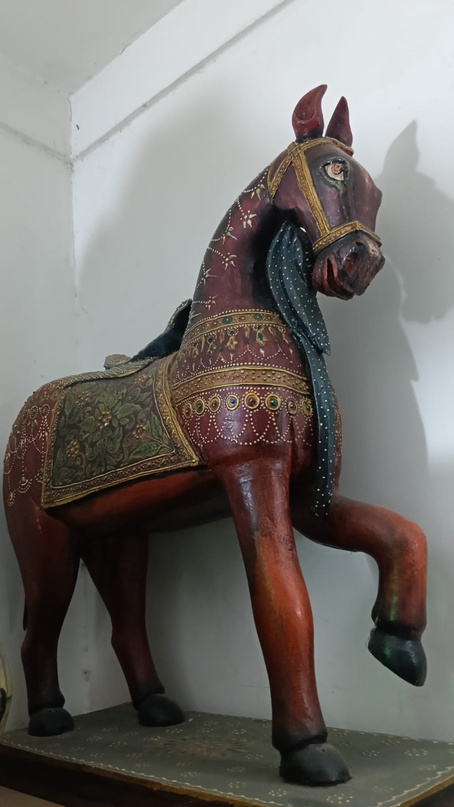 Handcrafted decorative wooden horse statue with gold detailing