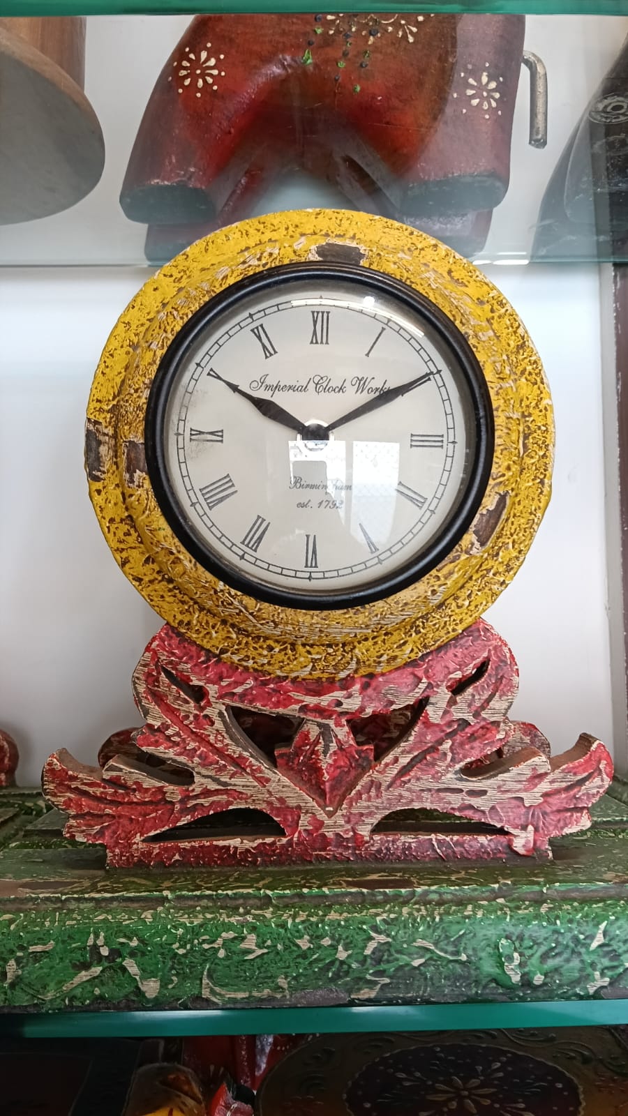 Handcrafted wooden table clock with carved stand and antique finish